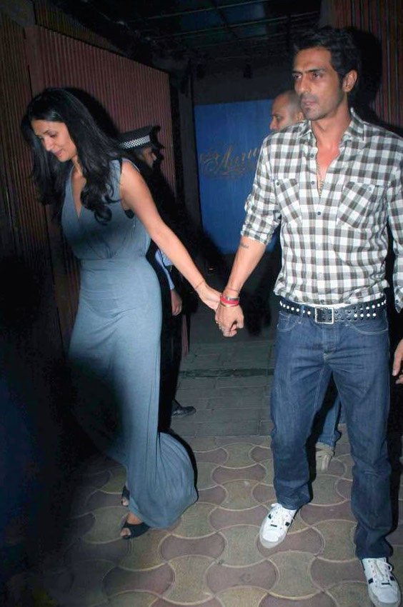 arjun_rampal_with_wife_mehr_jesia_20101230_1130405957.jpg